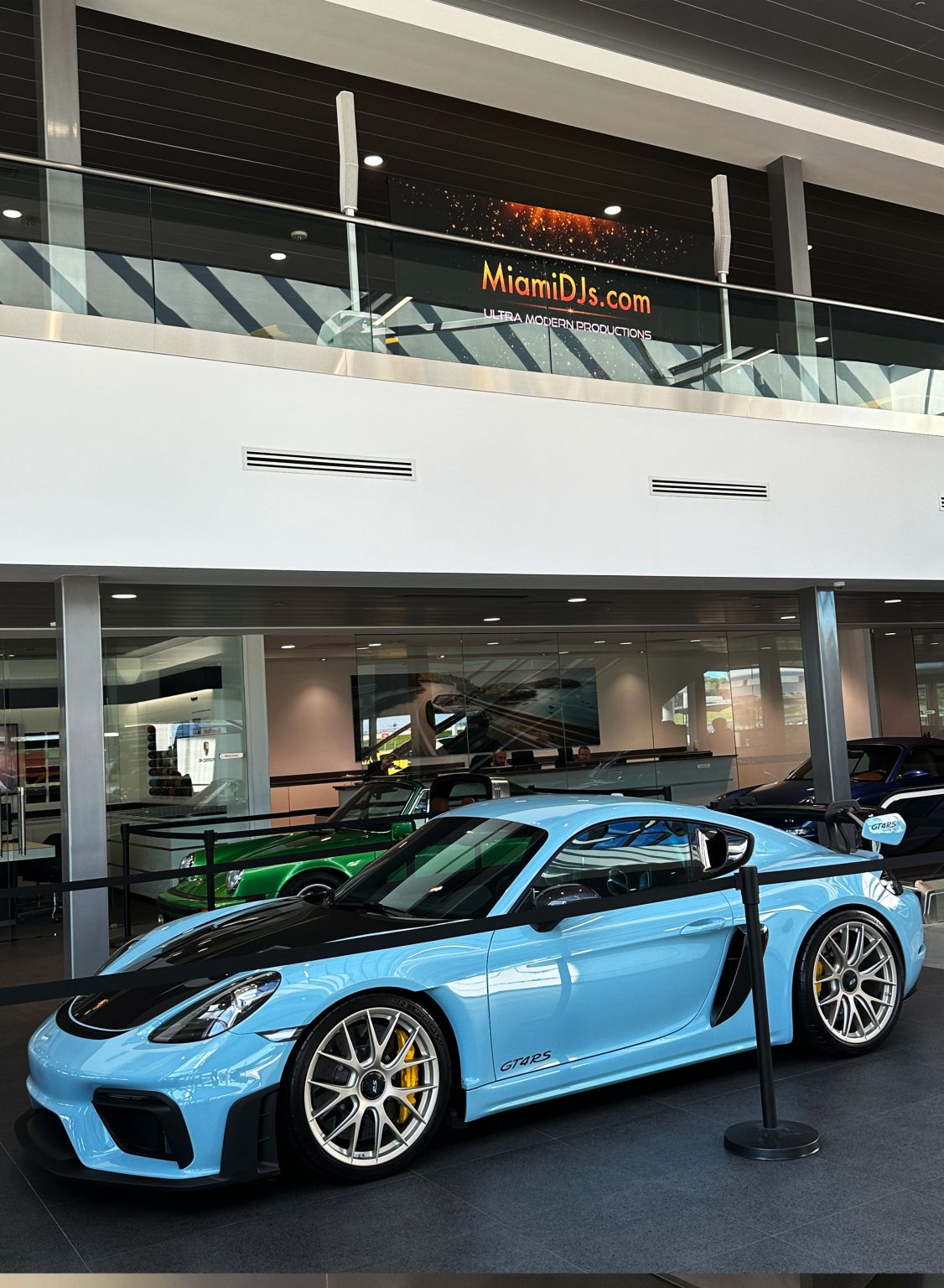 Corporate event setup inside the Porsche West Broward showroom