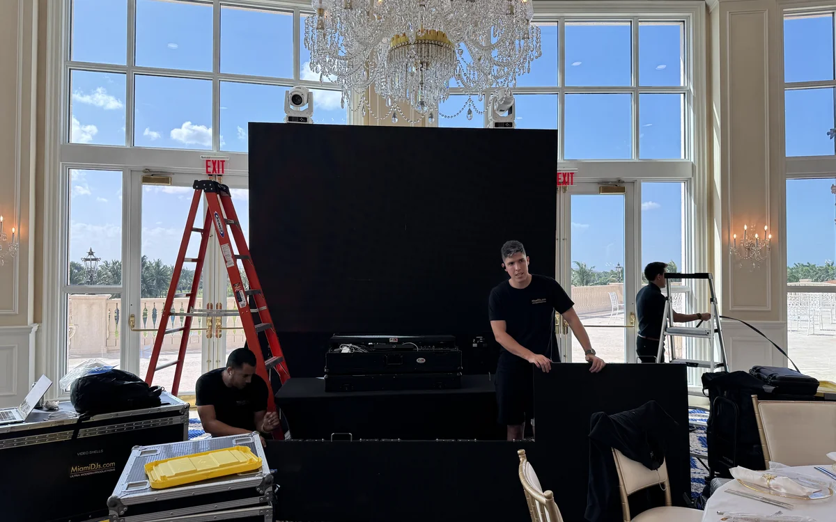 Miami DJs install crew setting up an LED video wall at a Miami ballroom