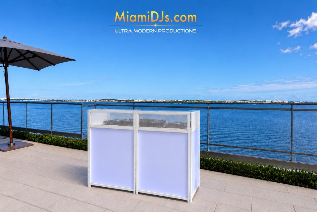 Miami DJs white DJ facade on a waterfront terrace